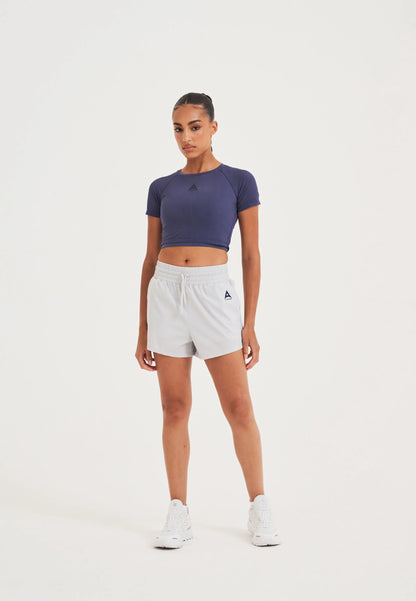WOMENS A-GAME TRAINING RUNNER SHORTS - GREY